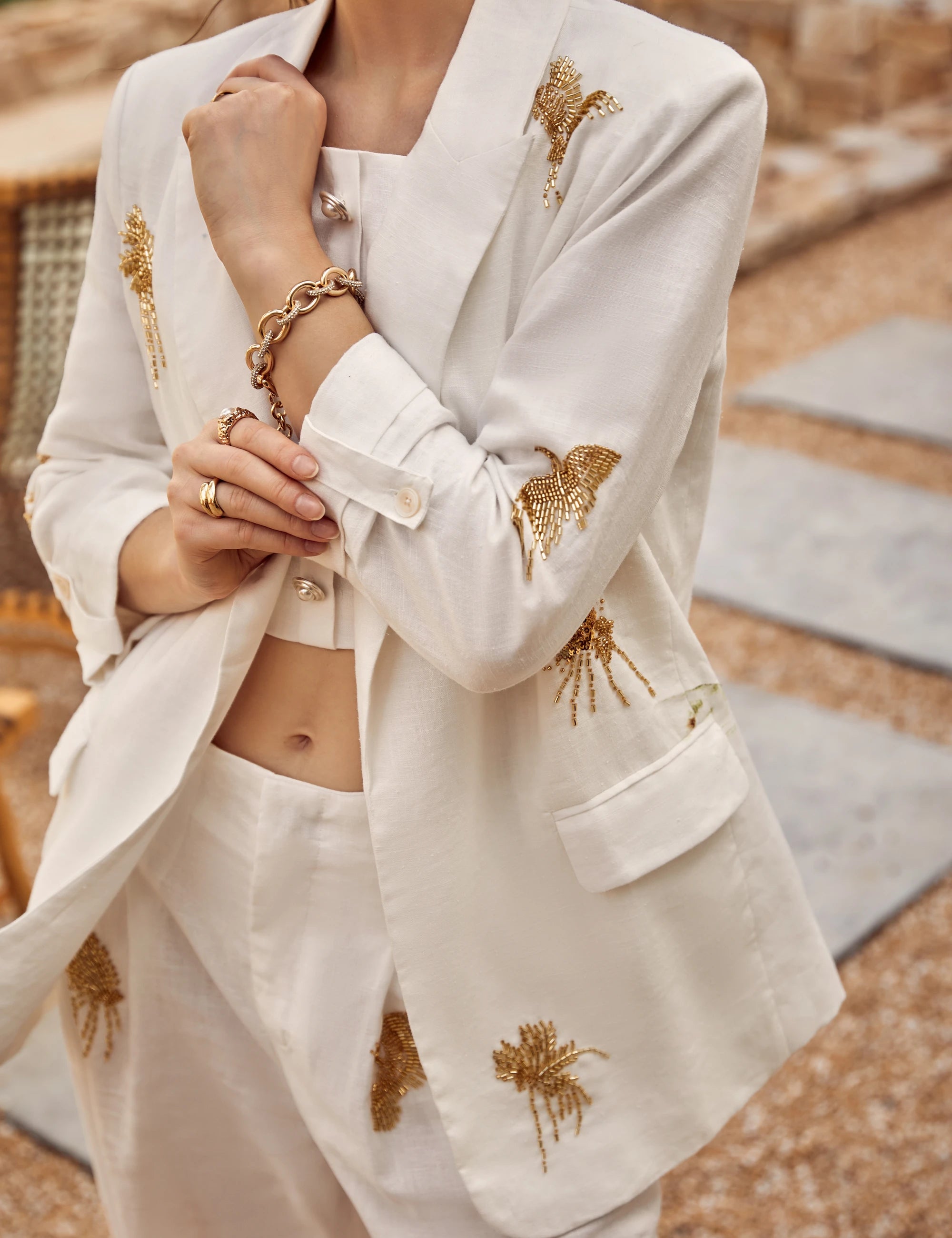 Elppis White Blazer with Gold Sequin Floral Embellishments, editorial styling view on model — SKU JD4W6708BO