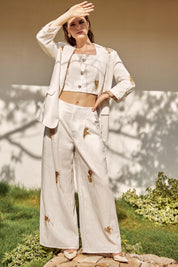 Elppis White Blazer with Gold Sequin Floral Embellishments, editorial styling view on model — SKU JD4W6708BO