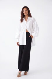 White Oversized Shirt with Vibrant Tiger and Peacock Embroidery — Model White Background View 2