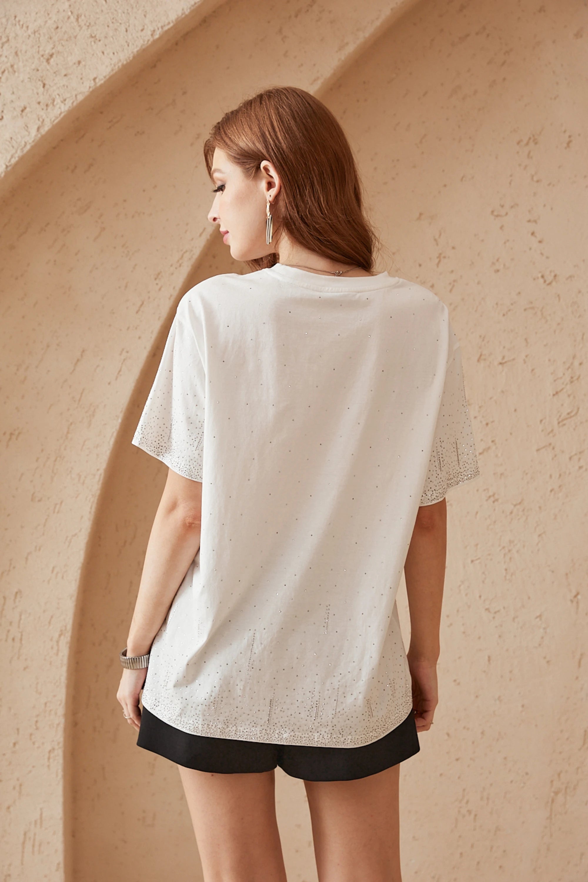 Elppis White Oversized T-Shirt with Gradient Rhinestone Dot Embellishments, editorial styling view on model — SKU 3B5E04542WW