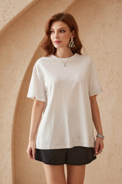 Elppis White Oversized T-Shirt with Gradient Rhinestone Dot Embellishments, editorial styling view on model — SKU 3B5E04542WW