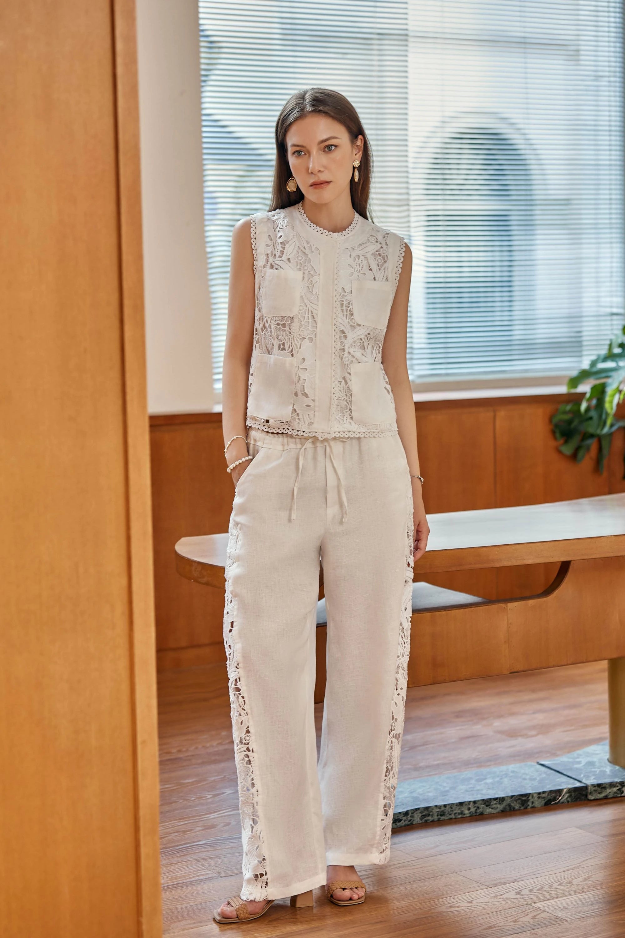 Elppis White Polyester-Cotton Blend Wide-Leg Lace Pants, editorial styling view on model — SKU 2B5I07801WW