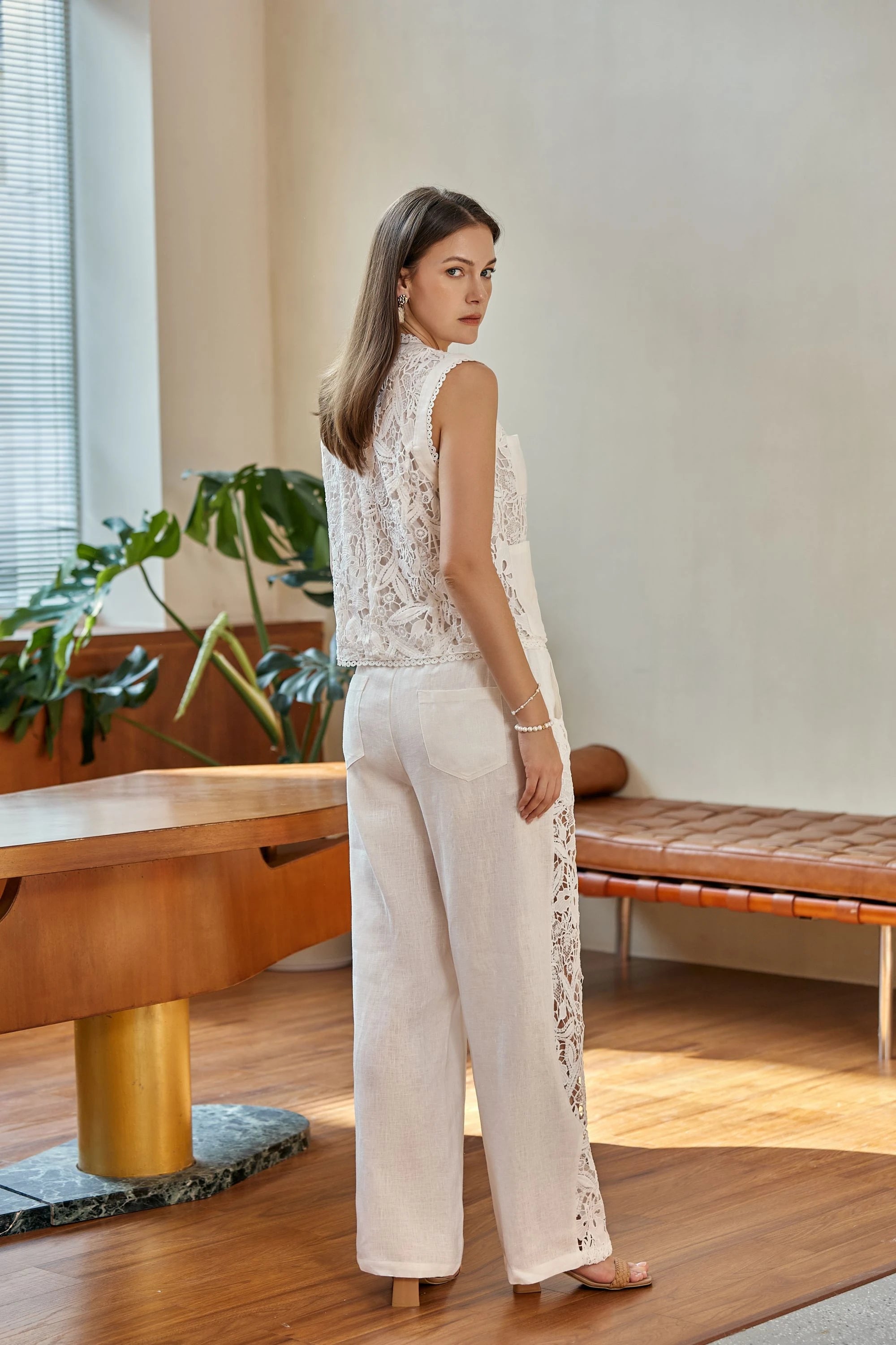 Elppis White Polyester-Cotton Blend Wide-Leg Lace Pants, editorial styling view on model — SKU 2B5I07801WW