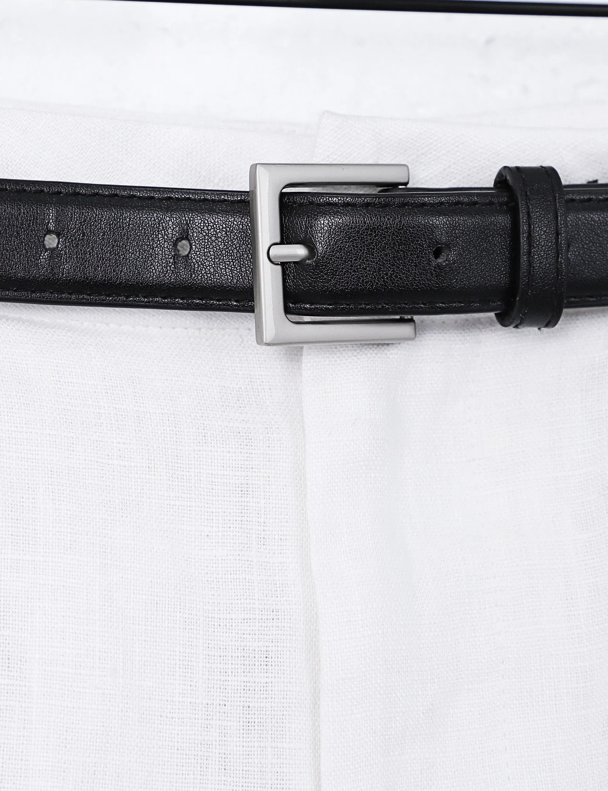 White Polyester High-Waisted Shorts with Rolled Hem and Leather Belt — Model White Background View 2