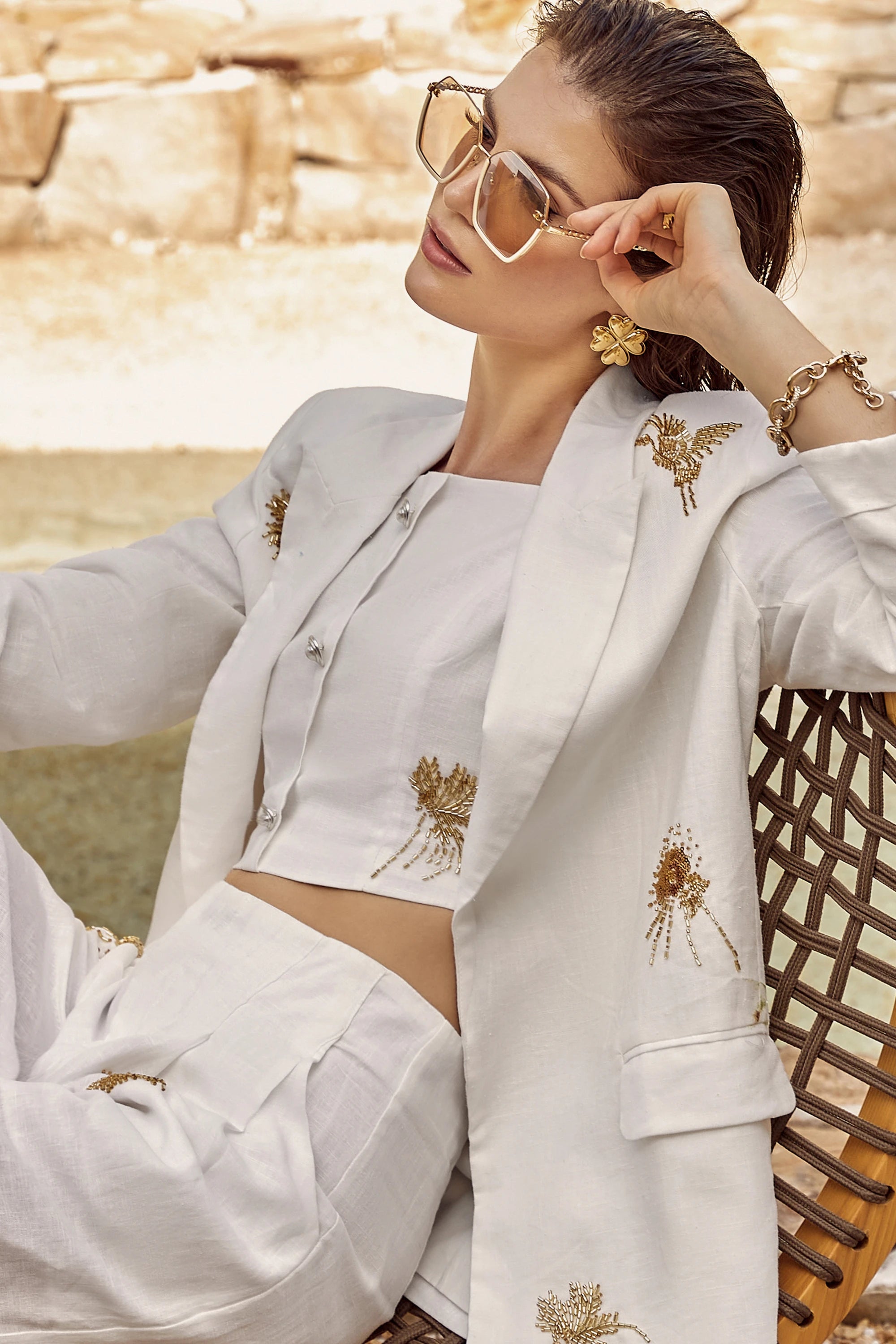 Elppis White Polyester Wide-Leg Pants with Gold Crane Embroidery, editorial styling view on model — SKU JD4I6657BO