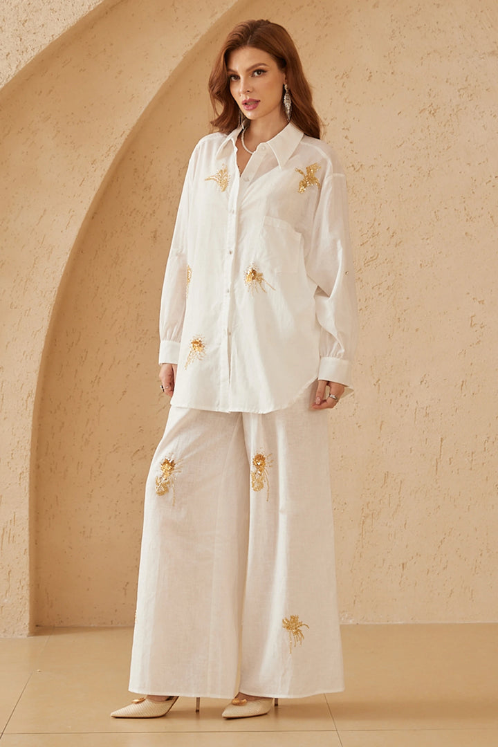 Elppis White Ramie-Cotton Blend Shirt with Gold Crane Bead Embroidery, editorial styling view on model — SKU JD4F6669BO