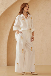 Elppis White Ramie-Cotton Blend Shirt with Gold Crane Bead Embroidery, editorial styling view on model — SKU JD4F6669BO