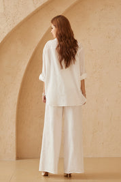 Elppis White Ramie-Cotton Blend Shirt with Gold Crane Bead Embroidery, editorial styling view on model — SKU JD4F6669BO